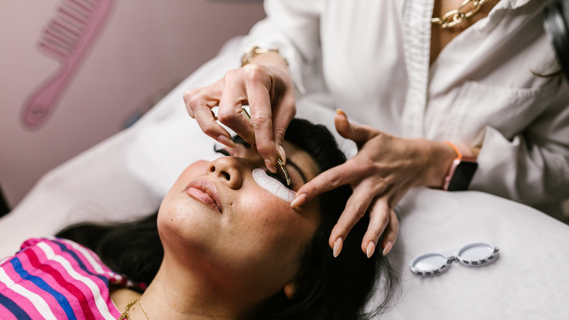 Licensed esthetician performing facial treatment