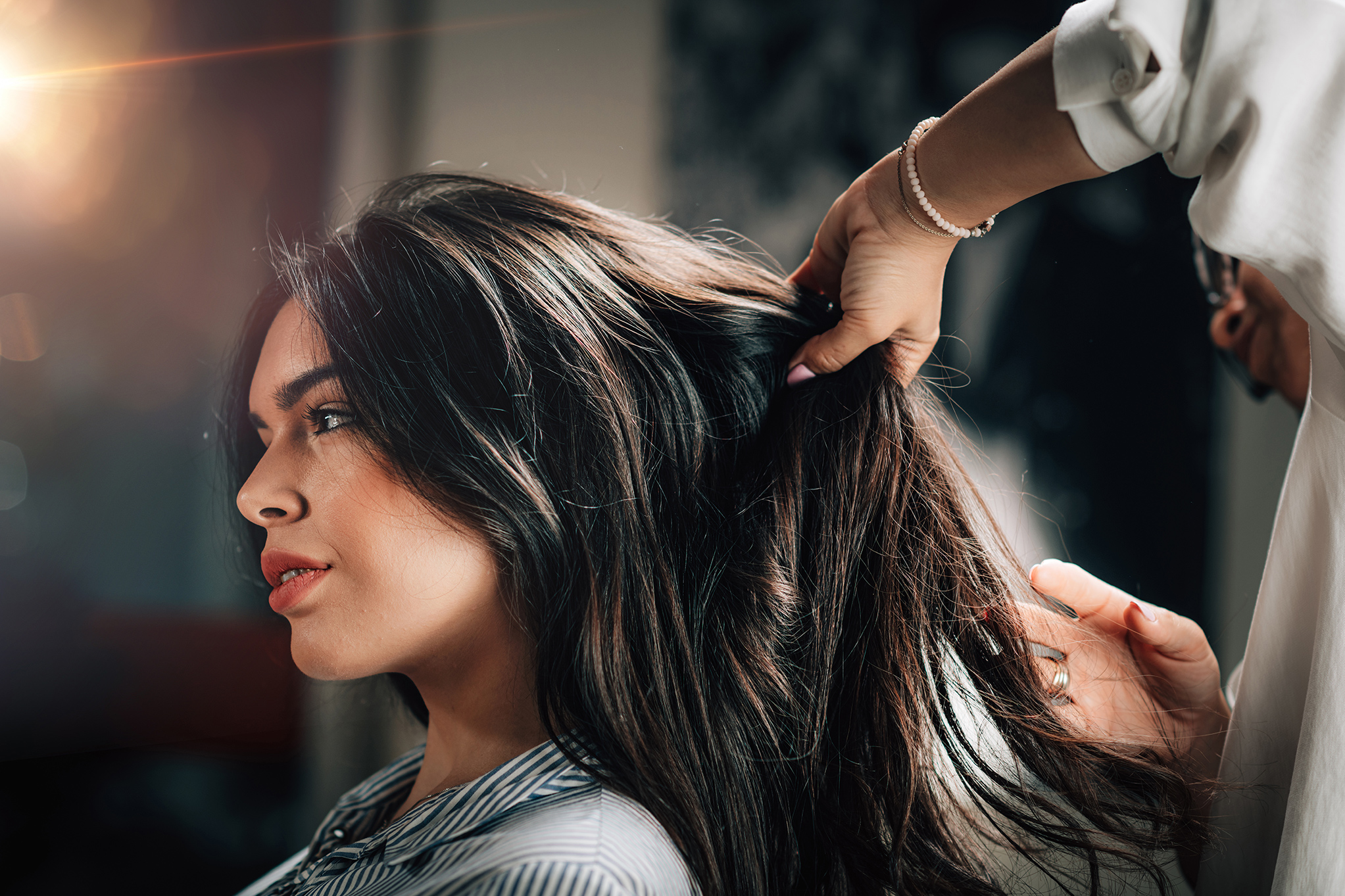 Picture of a lady getting her hair done at Ogle School