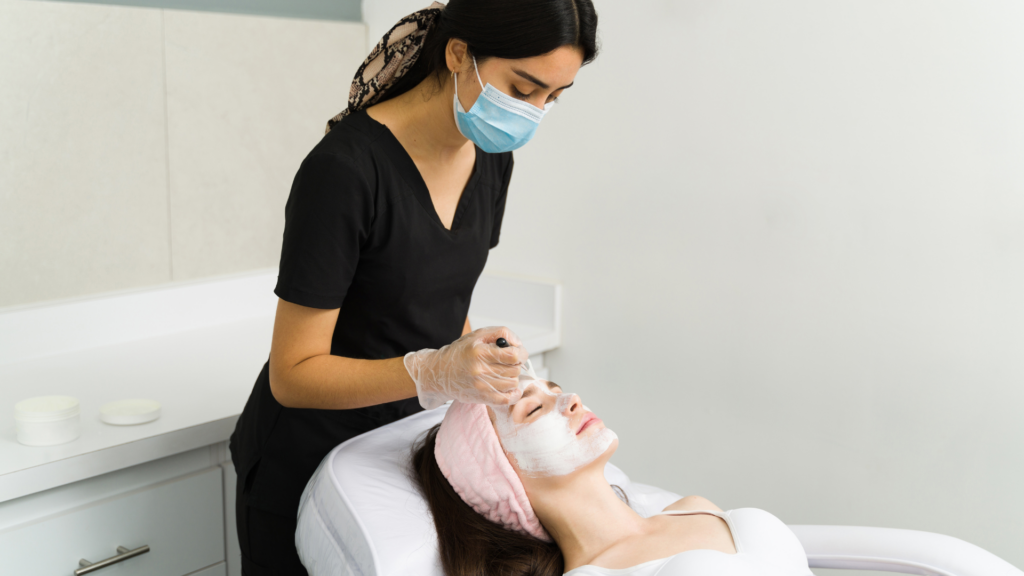 Licensed Esthetician working on a client