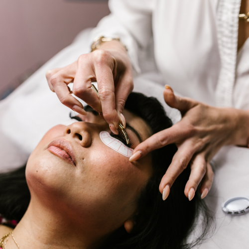 Licensed esthetician performing facial treatment